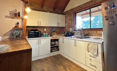 Parcela con dos casa en Condominio Reserva Cheillaco, comuna de Villarrica.