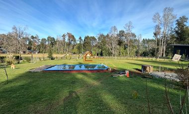 Parcela con dos casa en Condominio Reserva Cheillaco, comuna de Villarrica.