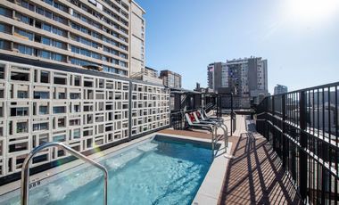 Exclusivo departamento en corazón de Santiago. Edificio Multifamily