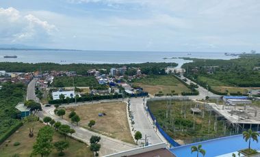 FOR RENT - 1BEDROOM WITH BALCONY FRONT SEA & POOL VIEW IN MACTAN NEWTOWN, LAPU-LAPU CEBU. POLISHED & MODERN UNIT.