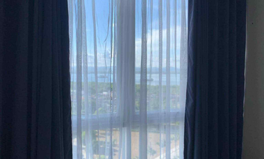 FOR RENT - 1BEDROOM WITH BALCONY FRONT SEA & POOL VIEW IN MACTAN NEWTOWN, LAPU-LAPU CEBU. POLISHED & MODERN UNIT.