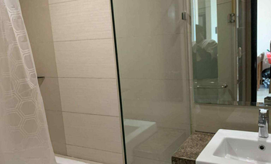FOR RENT - 1BEDROOM WITH BALCONY FRONT SEA & POOL VIEW IN MACTAN NEWTOWN, LAPU-LAPU CEBU. POLISHED & MODERN UNIT.