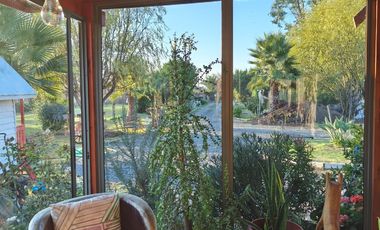 Parcela de 3000 mts2 con casa de 2 dormitorios 2 baños EN VENTA