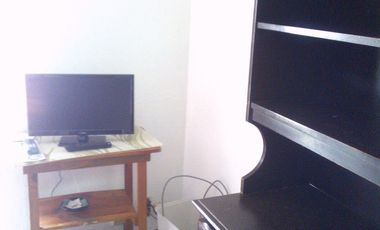 Habitación pequeña amueblada