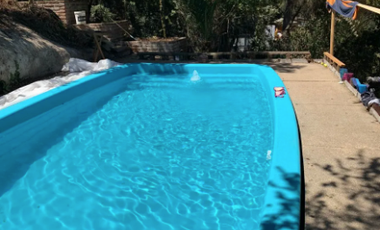 SE ARRIENDA CASA EN AMPLIO Y VERDE TERRENO EN LOS ALMENDROS