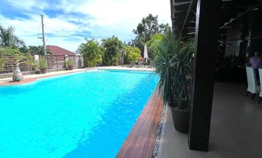 House and lot for SALE Consolacion Cebu with Huge pool situated highest peak of the community