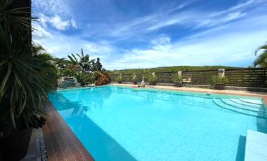 House and lot for SALE Consolacion Cebu with Huge pool situated highest peak of the community