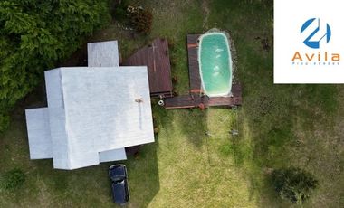 Curarrehue sector Caren parcela de 5.100m2 con casa y piscina a un costado carretera COD.VTAP224