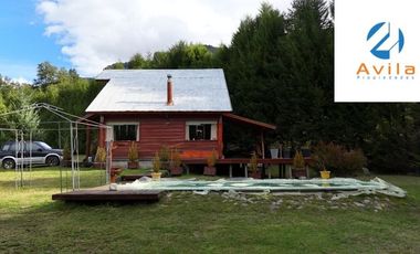 Curarrehue sector Caren parcela de 5.100m2 con casa y piscina a un costado carretera COD.VTAP224