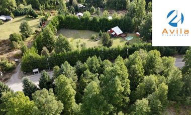 Curarrehue sector Caren parcela de 5.100m2 con casa y piscina a un costado carretera COD.VTAP224