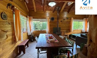 Curarrehue sector Caren parcela de 5.100m2 con casa y piscina a un costado carretera COD.VTAP224