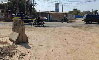 Tanah SHM pinggir Jalan  pagar beton ada bangunan