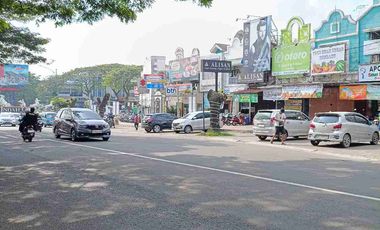 Tanah SHM pinggir Jalan  pagar beton ada bangunan