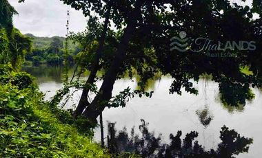 🏞️ Land for Sale – Nearly 5 Rai, Riverfront on the Khwae Noi River 🌊 with 45m Concrete Road Frontage, Only 20 Minutes from Kanchanaburi City! 🚖