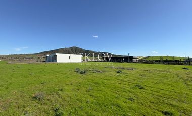 Parcela de 5.000 mts2, Con casa sin terminar