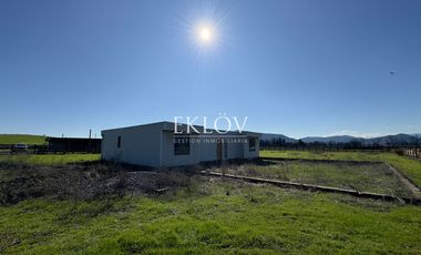 Parcela de 5.000 mts2, Con casa sin terminar