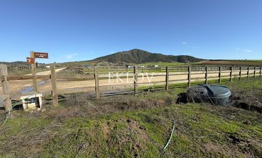 Parcela de 5.000 mts2, Con casa sin terminar
