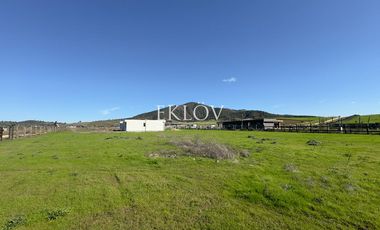 Parcela de 5.000 mts2, Con casa sin terminar