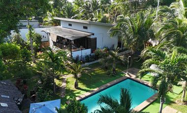HOUSE AND LOT WITH SWIMMING POOL INCOME GENERATING FOR SALE IN PANGLAO ISLAND OF BOHOL