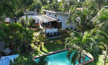 HOUSE AND LOT WITH SWIMMING POOL INCOME GENERATING FOR SALE IN PANGLAO ISLAND OF BOHOL
