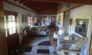 CASA ENTRE PUCON Y CURARREHUE EN 10.000 M2 DE TERRENO