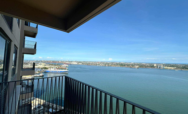 FOR RENT - MODERN 2BR WITH FRONT SEAVIEW BALCONY AND PARKING IN MANDANI BAY, CEBU. FURNISHED.