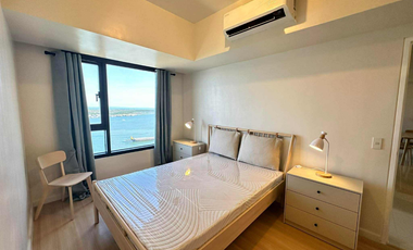 FOR RENT - MODERN 2BR WITH FRONT SEAVIEW BALCONY AND PARKING IN MANDANI BAY, CEBU. FURNISHED.