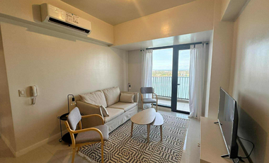 FOR RENT - MODERN 2BR WITH FRONT SEAVIEW BALCONY AND PARKING IN MANDANI BAY, CEBU. FURNISHED.