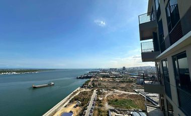 FOR RENT - MODERN 2BR WITH FRONT SEAVIEW BALCONY AND PARKING IN MANDANI BAY, CEBU. FURNISHED.
