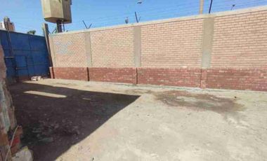 Terreno cercado zonificación O.U. de 1,709 m2, con portón metálico, colinda con Almacén Central de Ransa, Sedapal, Penal Sarita y AA HH Acapulco