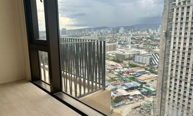 FOR RENT - LARGE 1BR UNIT WITH BALCONY SEA & MOUNTAINVIEW IN MANDANI BAY CEBU. WITH EXTRA ROOM FOR OFFICE OR MAID'S ROOM.