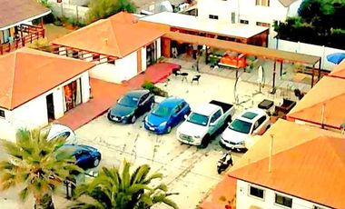 VENTA DE PARCELA CON CABAÑAS PARA TURISMO EN GUANAQUEROS