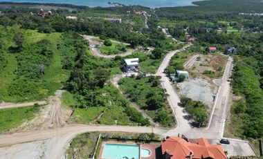 For Sale: Prime Overlooking Lot with Panoramic Ocean & Mountain Views