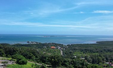 For Sale: Prime Overlooking Lot with Panoramic Ocean & Mountain Views
