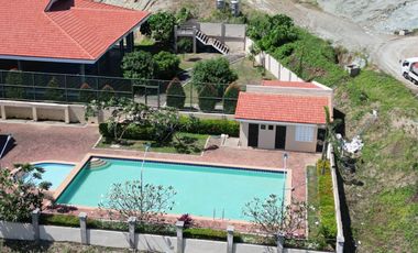 For Sale: Prime Overlooking Lot with Panoramic Ocean & Mountain Views