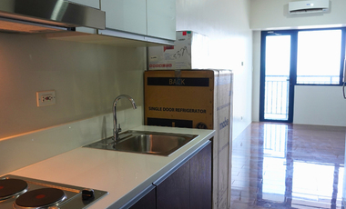 Bare Unit with Balcony for Rent in Air Residences in Makati City