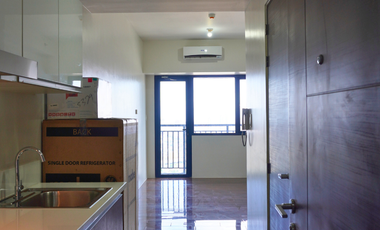 Bare Unit with Balcony for Rent in Air Residences in Makati City