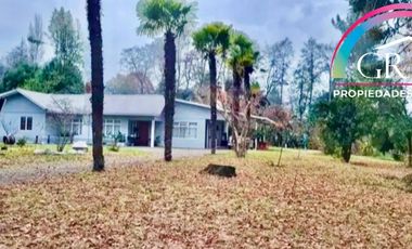 Gran Parcela con 2 casas y emprendimiento de Paintball