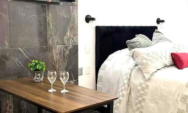 Suite con baño privado barra de cocina y lavadora