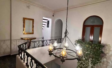 Suite con baño privado barra de cocina y lavadora