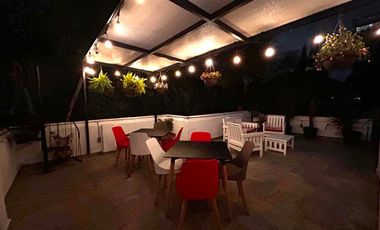 Suite con baño privado barra de cocina y lavadora