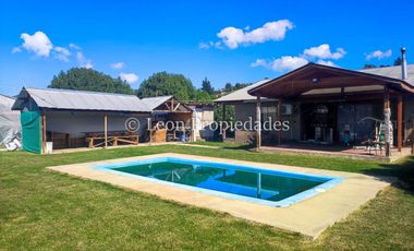 Leon Propiedades vende parcela con 2 casas y un galpón en camino el toro, Curacaví.