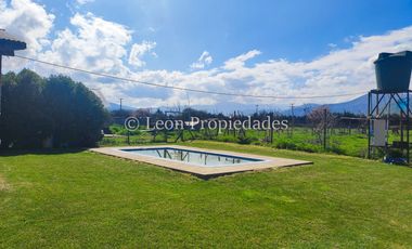 Leon Propiedades vende parcela con 2 casas y un galpón en camino el toro, Curacaví.