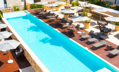 Departamento en venta a precio de oportunidad en Avenida principal dentro de Mérida con amenidades