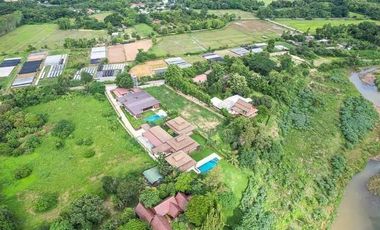 For Rent / Sale Luxury private pool villa along the Ping river and mountain view. Located in making Kaew Subdistrict, Mae Rim District, Chiang Mai.