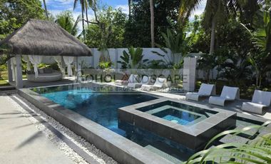 House & Lot for Sale in Bolod, Panglao, Bohol – Spacious Tropical Living with Pool & Solar Power