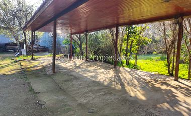 Leon Propiedades vende hermosa parcela de 1ha. con casa en sector los Naranjos, Curacaví.