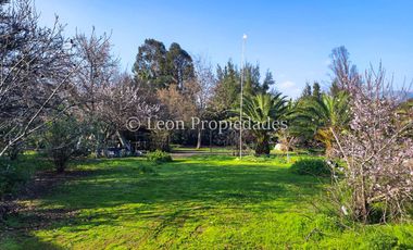 Leon Propiedades vende hermosa parcela de 1ha. con casa en sector los Naranjos, Curacaví.