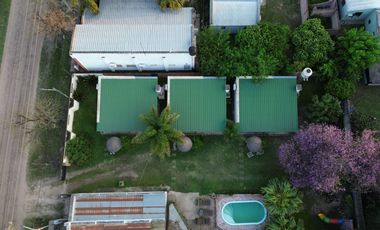 Se vende complejo de cabañas en Romang
