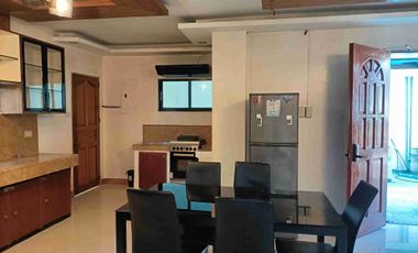 Single detached house with 6 bedrooms semi furnished inside Subd